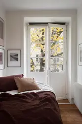 Apartment designs door opposite the window