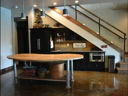 Staircase and kitchen design photo