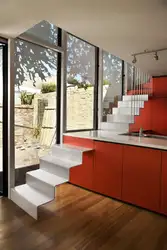 Staircase and kitchen design photo