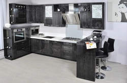 Black kitchen facade with flowers photo