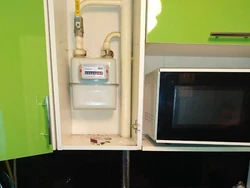 Ас үйдегі фотосуретте газ есептегішті жасырыңыз
