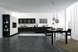 White gray black kitchen in the interior photo