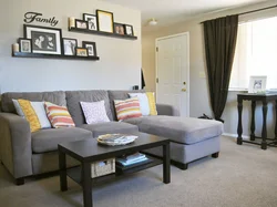 Shelves above the sofa in the living room photo