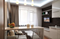 Design of a kitchen living room in a modern style in an apartment with a balcony