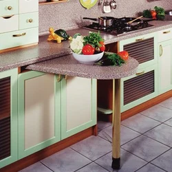 Kitchens with a pull-out table from under the countertop photo