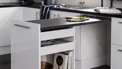 Ошхонаҳо бо мизи кашолашаванда аз зери акси countertop