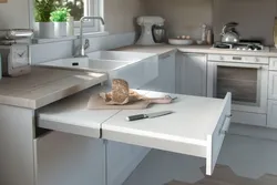 Kitchens with a pull-out table from under the countertop photo
