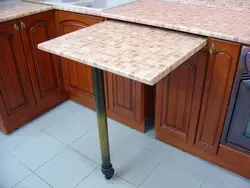Kitchens with a pull-out table from under the countertop photo