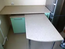 Kitchens with a pull-out table from under the countertop photo