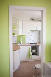 Doors to the kitchen photo of a small apartment