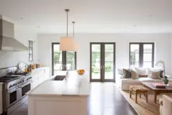 Combined living room with kitchen with access to the terrace photo