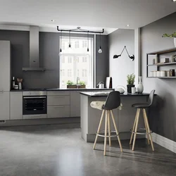 Kitchen with gray floor in the interior photo