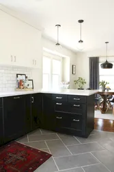 Kitchen with gray floor in the interior photo