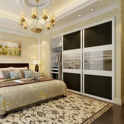 Photo of a bedroom in a modern style with a compartment