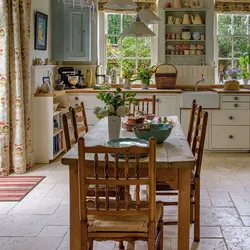 Country house kitchen design in rustic style