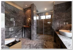 Bath interior with stone tiles