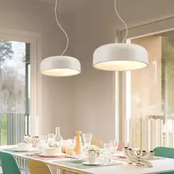 Photo of a house kitchen with chandeliers