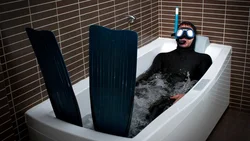 Photo of a man in a bath