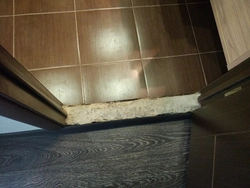 Threshold from the bathroom to the corridor photo