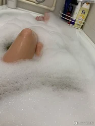 Photo in the bathtub in the foam