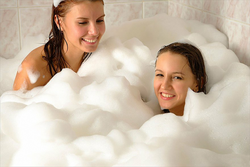 Photo in the bathtub in the foam