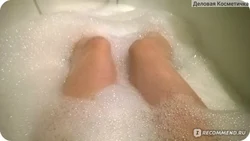Photo in the bathtub in the foam