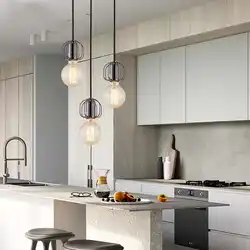 Pendant lamps in the kitchen above the table photo in the interior