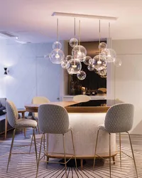 Pendant lamps in the kitchen above the table photo in the interior