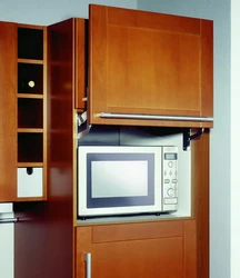Cabinet pencil case for microwave in the kitchen photo