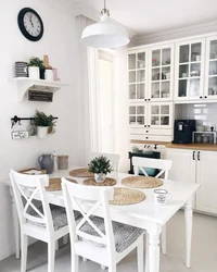 Kitchen interior with white table