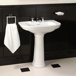 Sink with pedestal in the bathroom interior