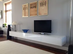Hanging shelves in the living room photo on the wall
