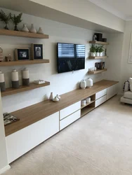 Hanging shelves in the living room photo on the wall