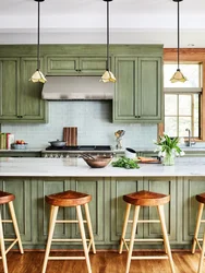 Green Kitchen With Wooden Countertops In The Interior