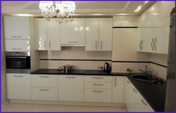 White corner kitchens in a modern style photo in the interior
