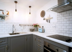 Boar tiles on the apron photo in the kitchen interior