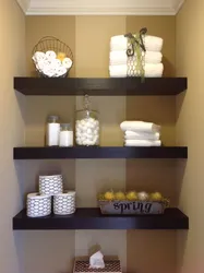 Bathroom design with shelves in the wall