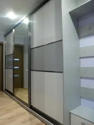 Hallway design in an apartment with a wardrobe photo in light colors