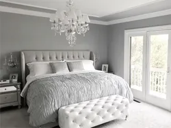 White wallpaper in the bedroom interior photo
