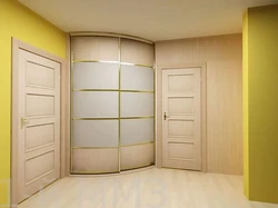 Built-in wardrobe in the hallway corner design