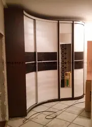 Built-in wardrobe in the hallway corner design