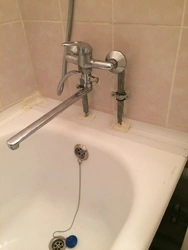 Photo of how to install faucets on a bathtub