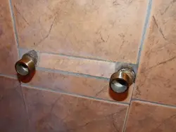 Photo of how to install faucets on a bathtub