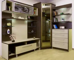 Müasir üslubda fotoşəkildə oturma otağı üçün künc qarderoblu divarlar