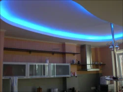 Plasterboard ceiling with lighting two-level design in the kitchen