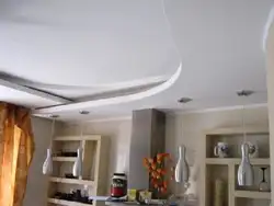 Plasterboard ceiling with lighting two-level design in the kitchen