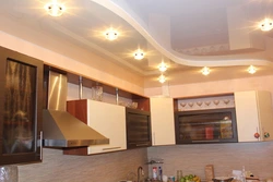 Plasterboard ceiling with lighting two-level design in the kitchen