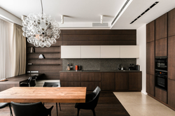 Brown kitchen and living room in the interior photo