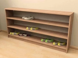 DIY shoe rack made of wood photo in the hallway