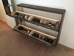DIY shoe rack made of wood photo in the hallway